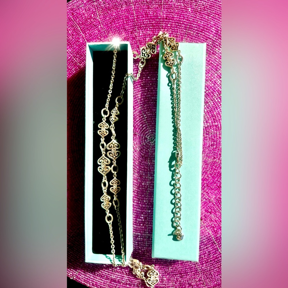 Brighton Alcazar Heart necklace on 40-43 inch silver tone chain.